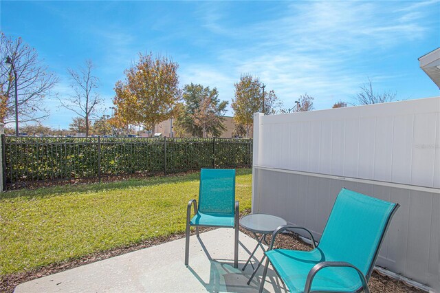 4708 Tribute Trl, Kissimmee, FL 34746 - view of patio / terrace featuring a fenced backyard