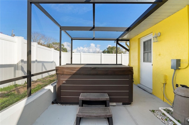 exterior space featuring a hot tub