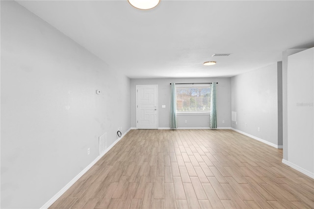 empty room featuring light hardwood / wood-style flooring