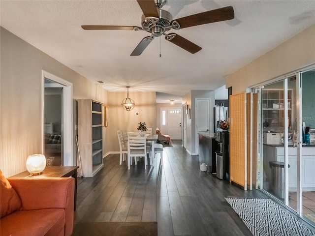 dining space with dark hardwood / wood-style flooring