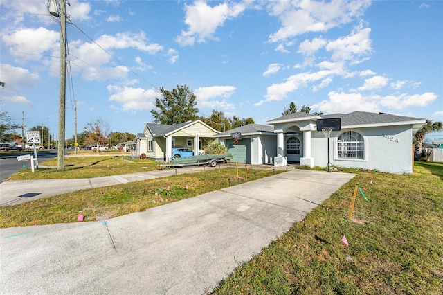 ranch-style home featuring a front yard