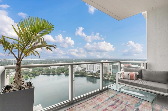 balcony featuring a water view