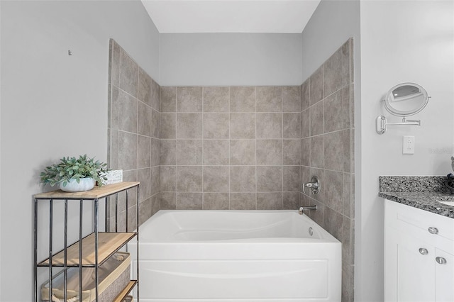 bathroom featuring vanity and a bathing tub