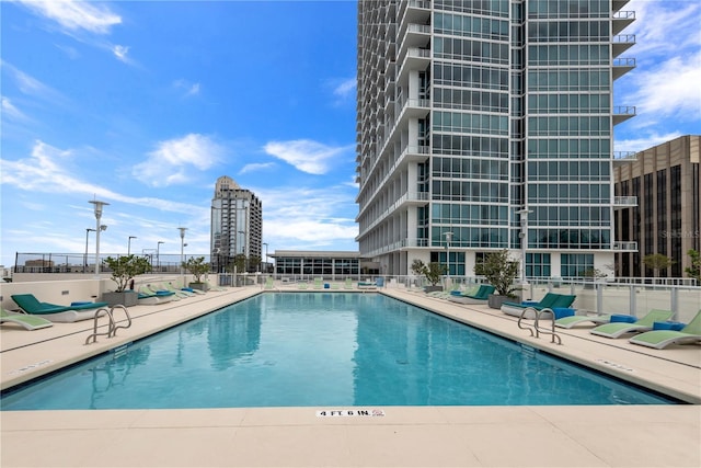 view of pool featuring a patio