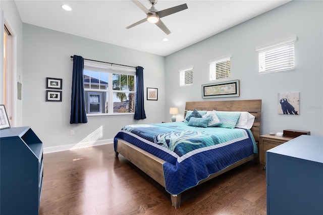 bedroom with dark wood-type flooring and ceiling fan