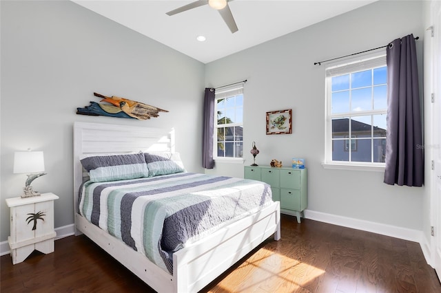 bedroom featuring ceiling fan and dark hardwood / wood-style flooring