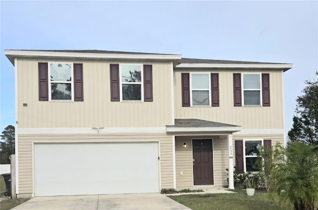 view of front of property featuring a garage