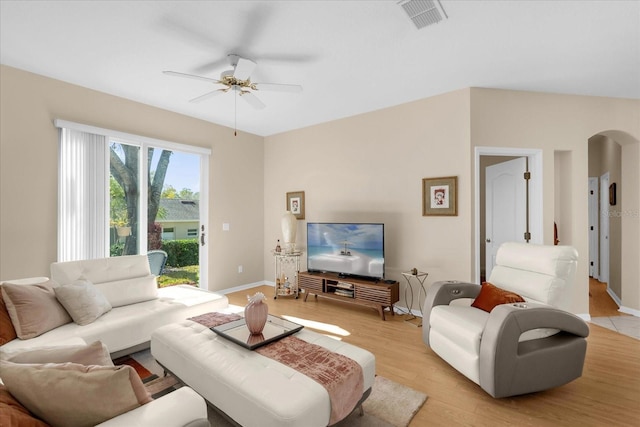 living room featuring ceiling fan and light wood-type flooring