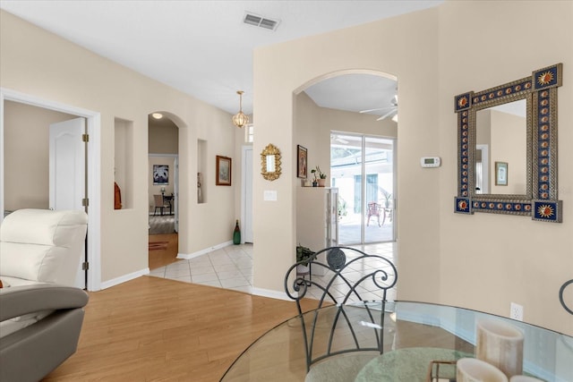 dining area featuring ceiling fan and light hardwood / wood-style flooring