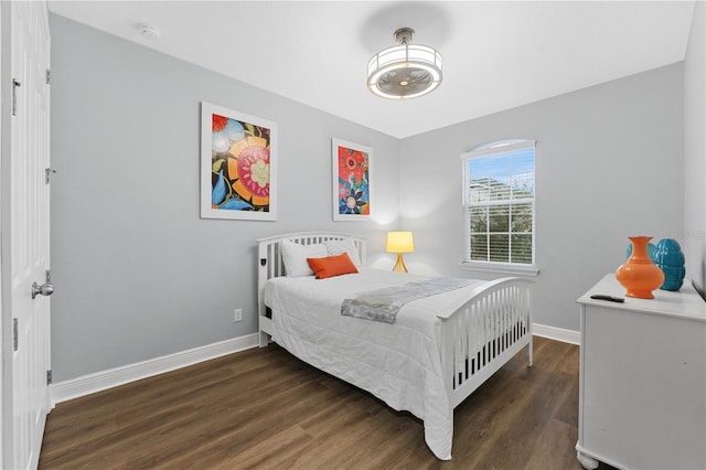 bedroom featuring dark hardwood / wood-style floors