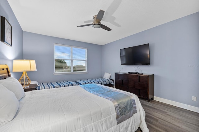 bedroom featuring ceiling fan and hardwood / wood-style floors