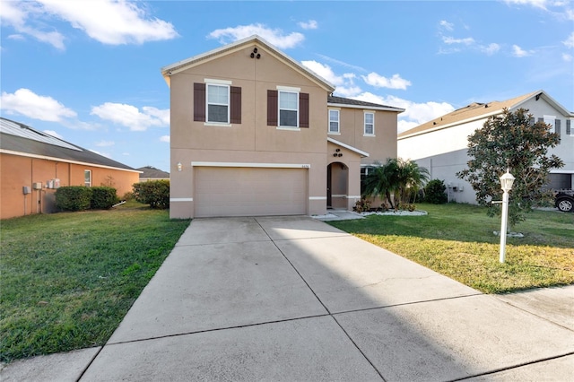 view of front property featuring a garage and a front lawn