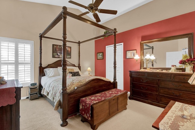 bedroom with ceiling fan and light colored carpet