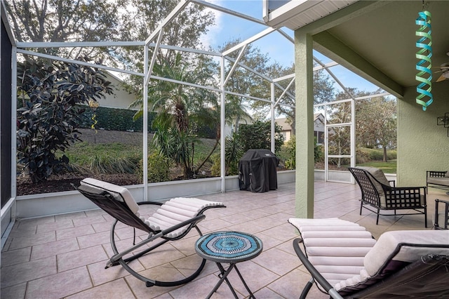 view of patio with a lanai