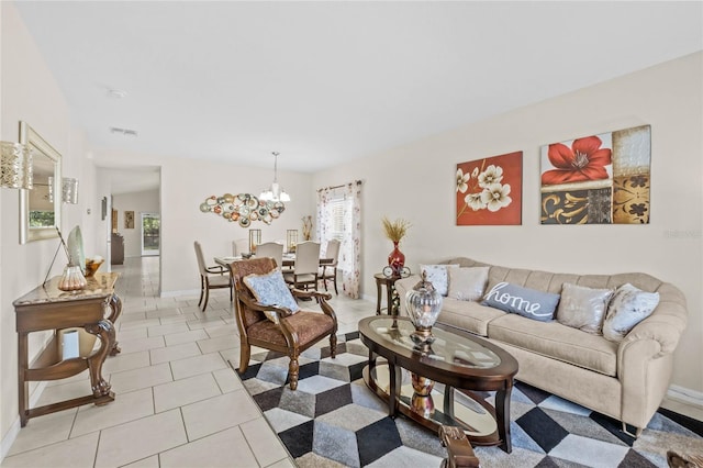 tiled living room with a chandelier