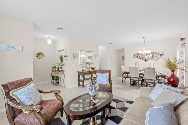 tiled living room with an inviting chandelier