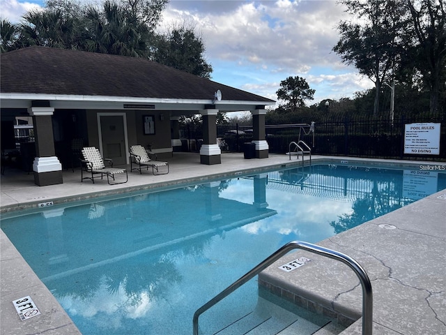 view of pool with a patio