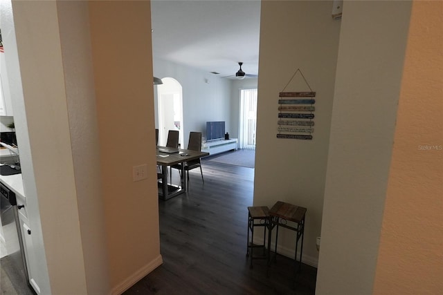 corridor featuring dark hardwood / wood-style floors