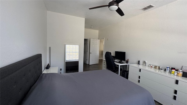 bedroom with ceiling fan and wood-type flooring