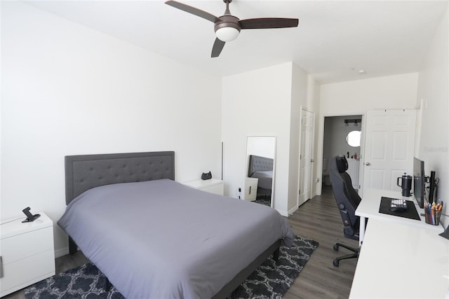 bedroom featuring ceiling fan and dark hardwood / wood-style floors