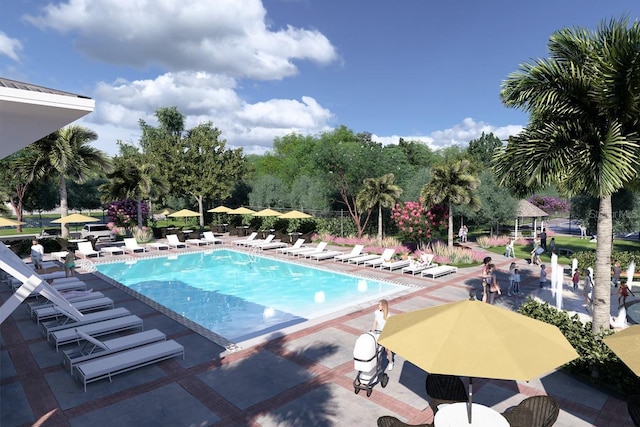 view of swimming pool featuring a patio area