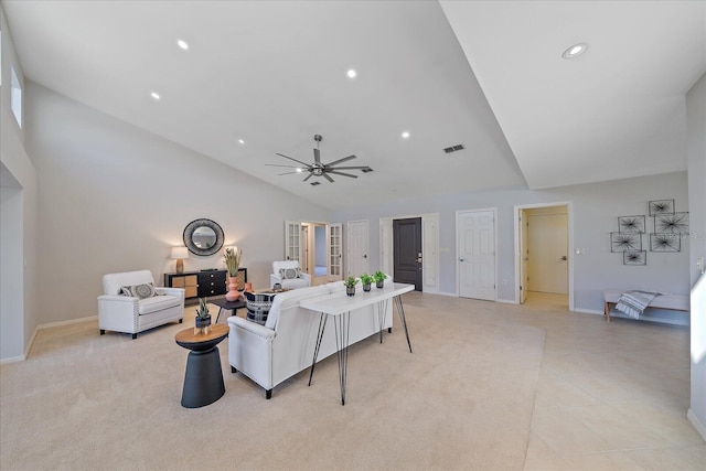 living room featuring vaulted ceiling and ceiling fan