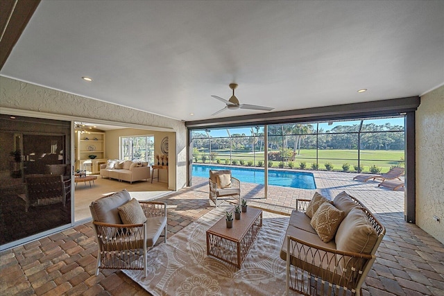 view of pool with ceiling fan