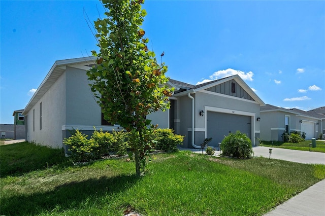 ranch-style home featuring a garage and a front lawn