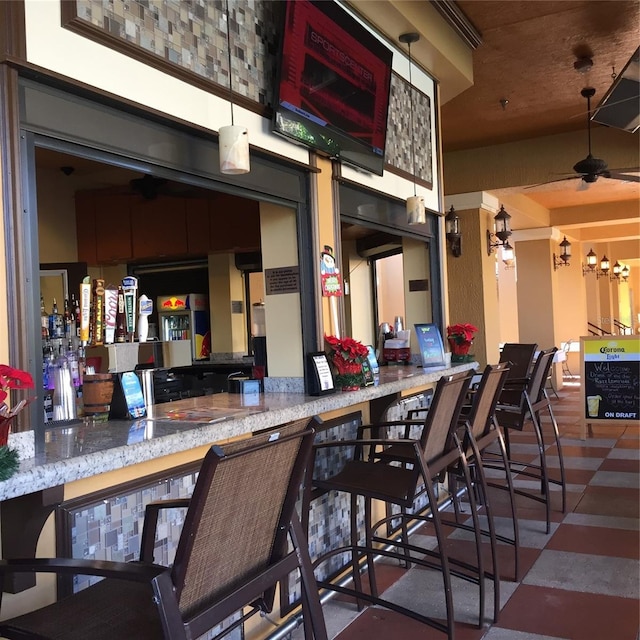 view of patio featuring a bar