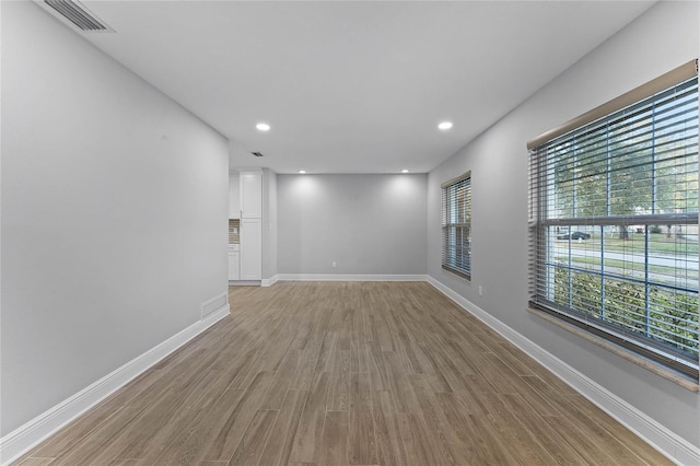 spare room featuring light hardwood / wood-style floors