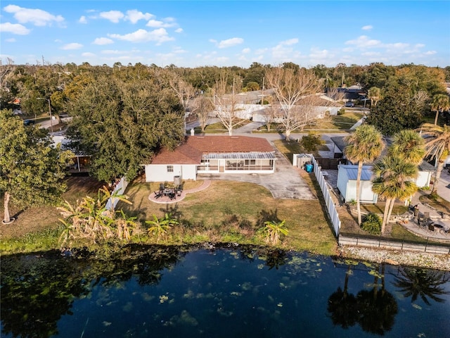 drone / aerial view with a water view