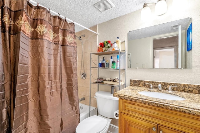 full bathroom featuring shower / bathtub combination with curtain, vanity, toilet, and a textured ceiling