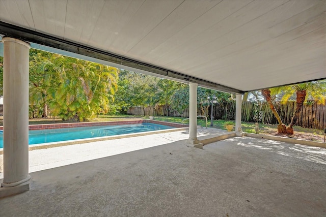 view of swimming pool with a patio