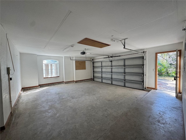 garage featuring a garage door opener