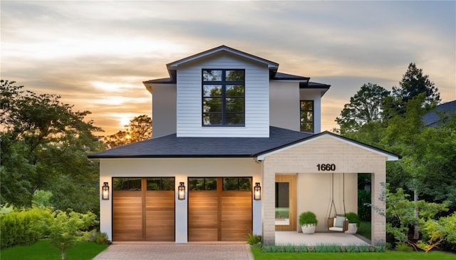 view of front of home featuring a garage