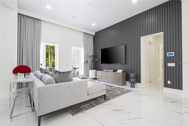 living room with a high ceiling