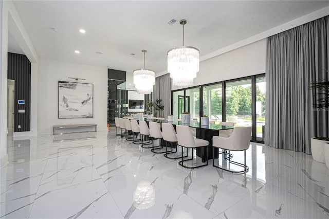 dining space featuring a notable chandelier