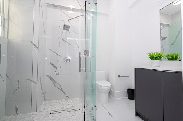 bathroom featuring toilet, vanity, and walk in shower