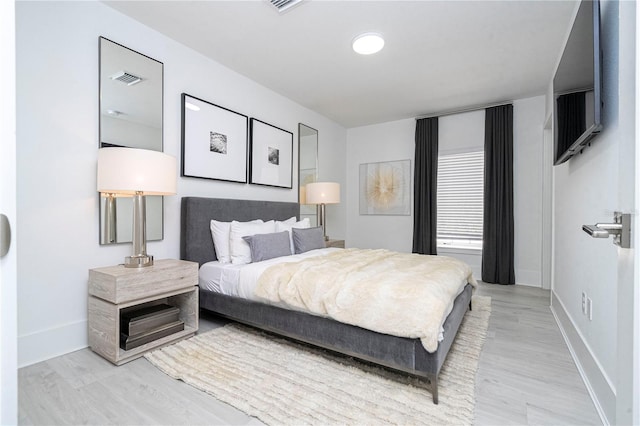 bedroom featuring light hardwood / wood-style flooring