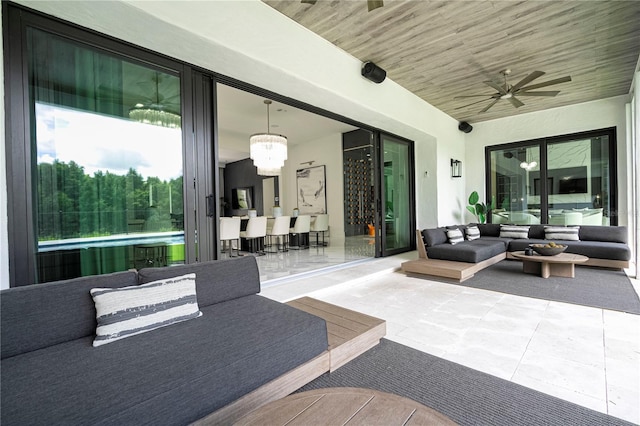 view of patio / terrace featuring an outdoor living space and ceiling fan