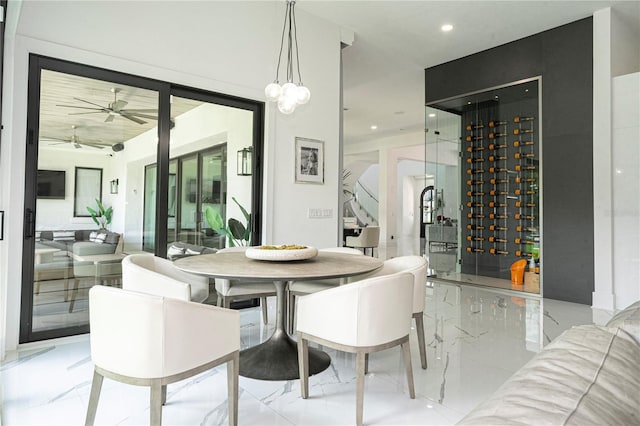 dining space featuring ceiling fan