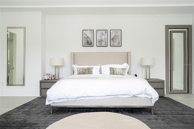 bedroom featuring hardwood / wood-style floors