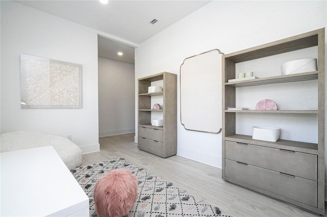 bedroom with light hardwood / wood-style flooring