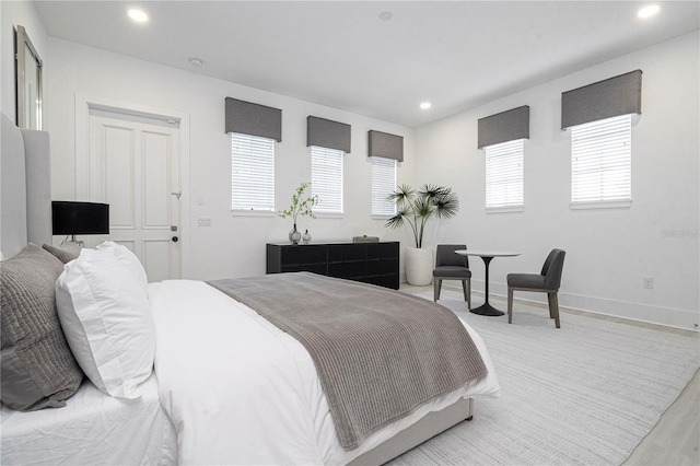 bedroom with light hardwood / wood-style floors