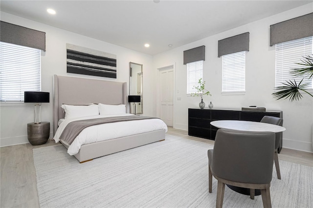 bedroom featuring light wood-type flooring