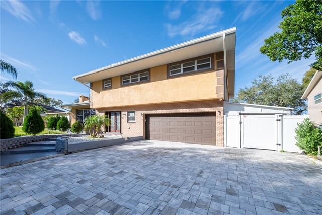 5006 Monet Ave, Belle Isle, FL 32812 - view of front facade with a garage
