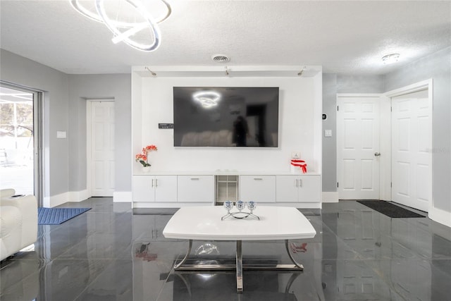 5006 Monet Ave, Belle Isle, FL 32812 - living room with a textured ceiling