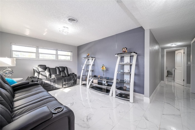 5006 Monet Ave, Belle Isle, FL 32812 - living room featuring a textured ceiling