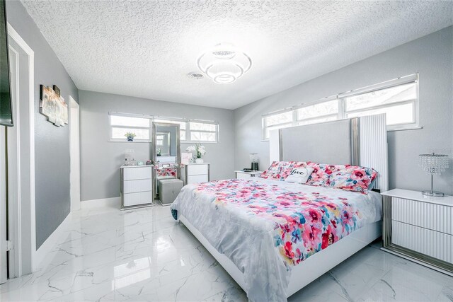 5006 Monet Ave, Belle Isle, FL 32812 - bedroom with a textured ceiling