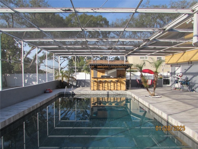 5006 Monet Ave, Belle Isle, FL 32812 - view of swimming pool with a lanai, a patio, and exterior bar